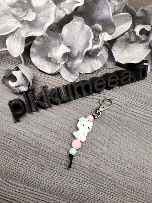 Avaimenperä Hello Kitty (vaaleanpunainen / minttu)