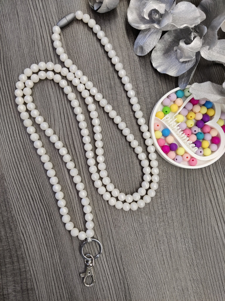 Avainnauha olan yli (helmiäisvalkoinen)