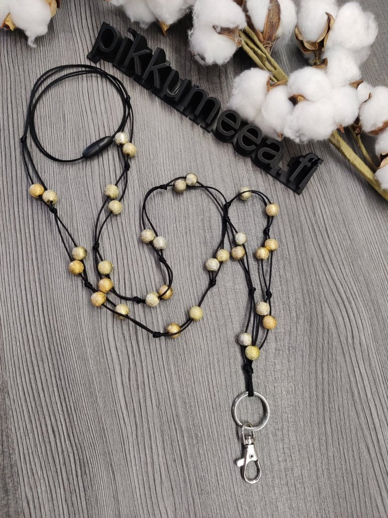 Avainnauha olan yli akryylihelmistä (kulta) - pikkumeea