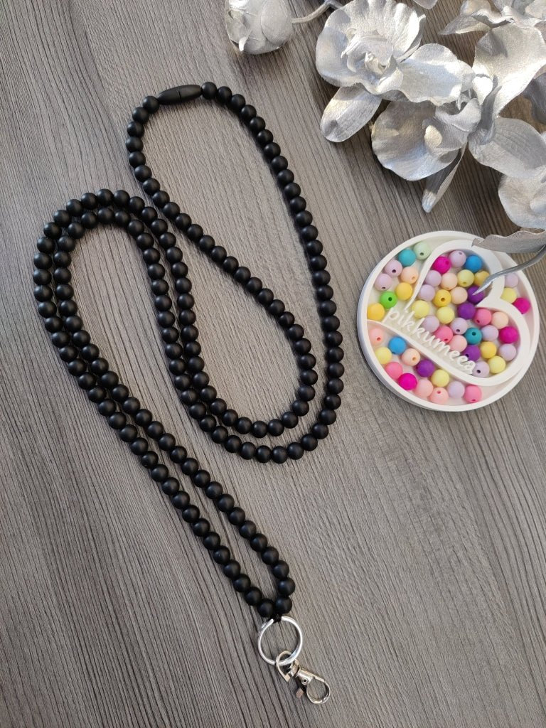 Avainnauha olan yli (musta) - pikkumeea