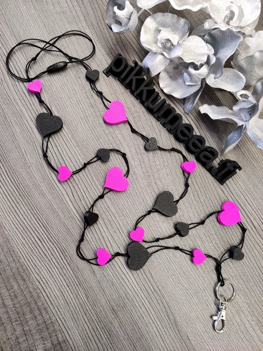 Avainnauha olan yli Sydän (pinkki / musta kimaltava) - pikkumeea