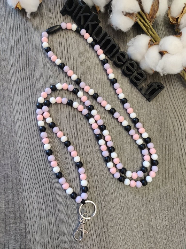 Avainnauha olan yli (vaaleanliila / musta / valkoinen / vaaleanpunainen) - pikkumeea