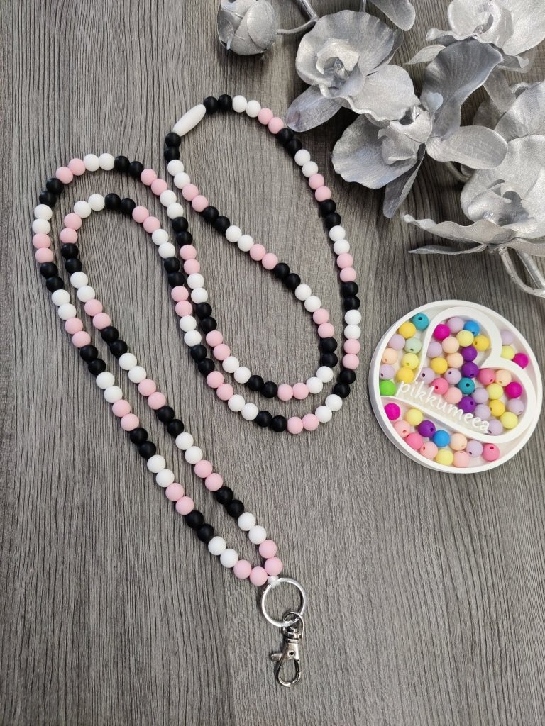 Avainnauha olan yli (valkoinen / vaaleanpunainen / musta) - pikkumeea