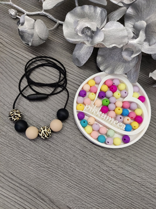 Imetys-/kantokoru leopardi (eri värejä)