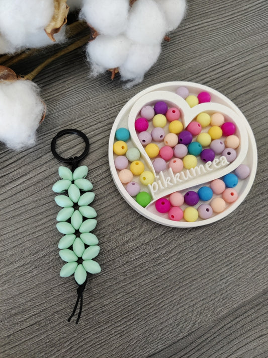 Avaimenperä kukka (eri värejä)