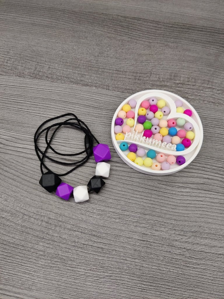 Imetys - /kantokoru (tummanliila / musta / valkoinen) - pikkumeea