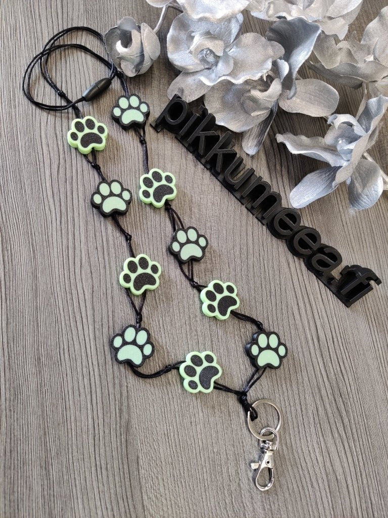 Avainkaulanauha Pimeässä hohtava tassu 90cm - pikkumeea