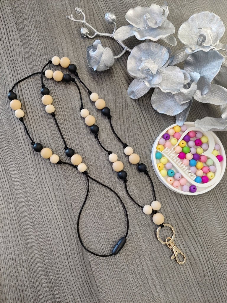 Avainnauha olan yli (beige / vaalea beige / musta) - pikkumeea