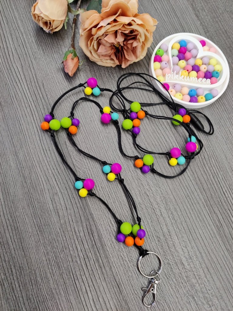 Avainnauha olan yli (fuksia / vihreä / turkoosi / keltainen / tummanliila / oranssi) - pikkumeea