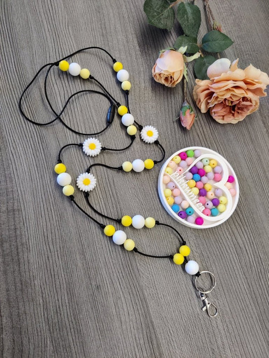 Avainnauha olan yli Päivänkakkara (keltainen / valkoinen / vaaleankeltainen) - pikkumeea