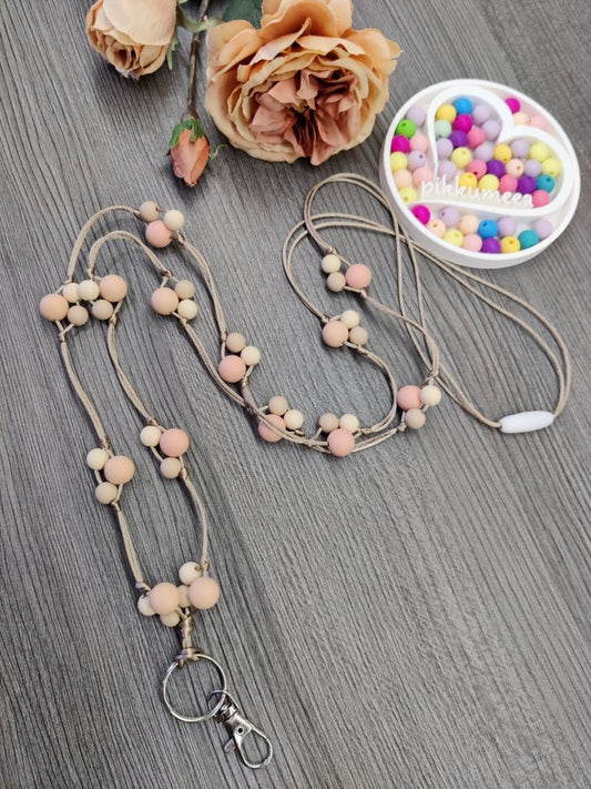 Avainnauha olan yli (persikka / beige / vaalea beige) - pikkumeea