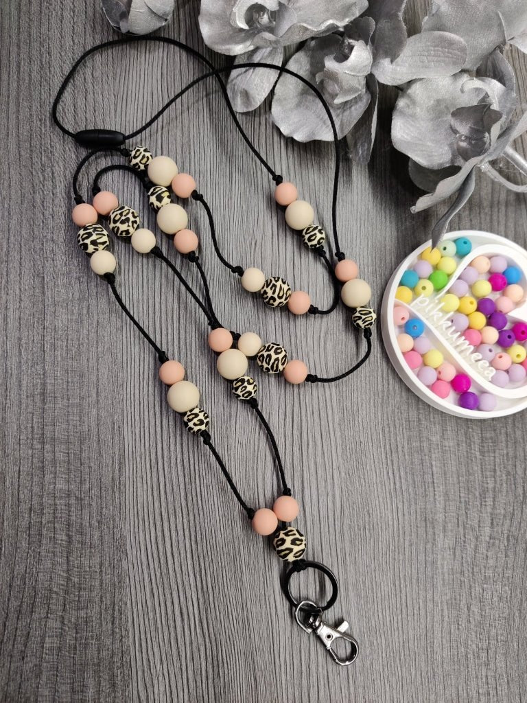 Avainnauha olan yli (persikka / leopardi / vaalea beige) - pikkumeea