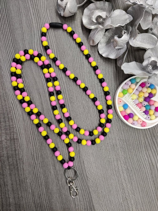 Avainnauha olan yli (pinkki / musta / keltainen) - pikkumeea