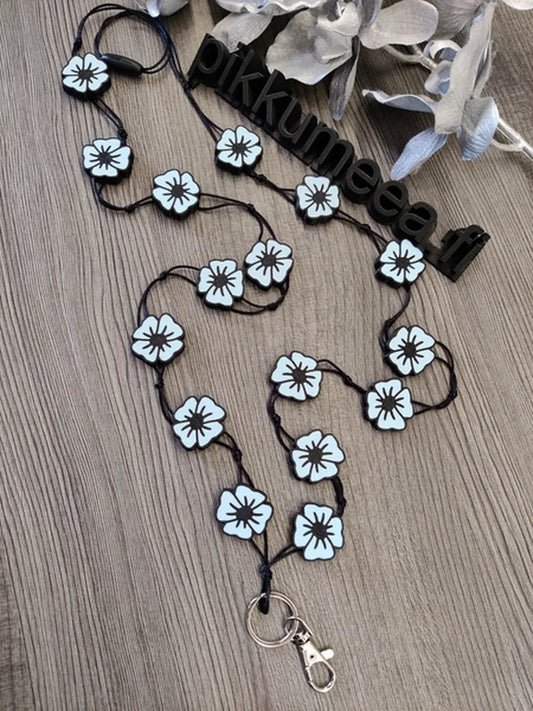 Avainnauha olan yli Unikko (vaaleansininen) - pikkumeea