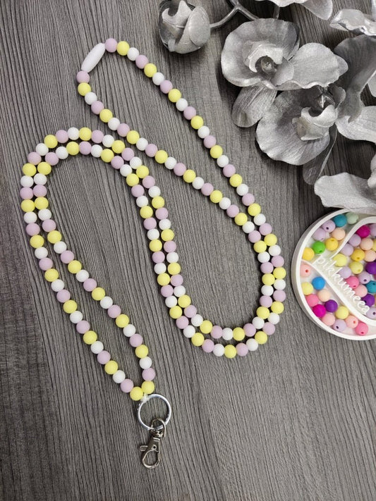 Avainnauha olan yli (vaaleankeltainen / vaaleanliila / valkoinen) - pikkumeea