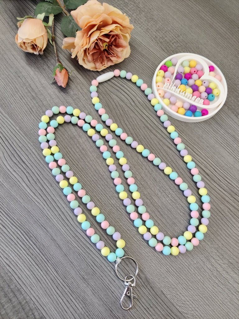 Avainnauha olan yli (vedensininen / vaaleankeltainen / vaaleanliila / minttu / vaaleanpunainen) - pikkumeea