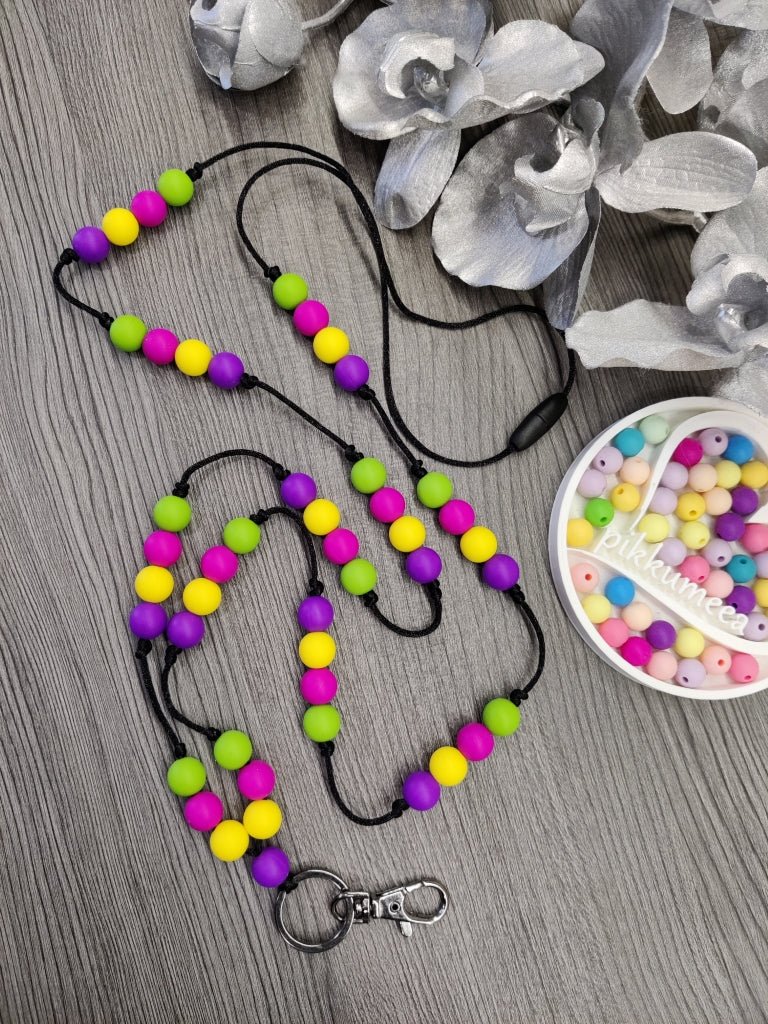 Avainnauha olan yli (vihreä / liila / keltainen / fuksia) - pikkumeea