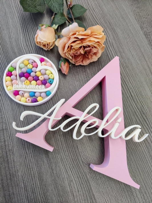 Iso koristekirjain nimellä - pikkumeea