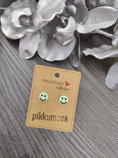 Nappikorvakorut Pimeässä hohtava smile (vaaleanvihreä / musta) - pikkumeea