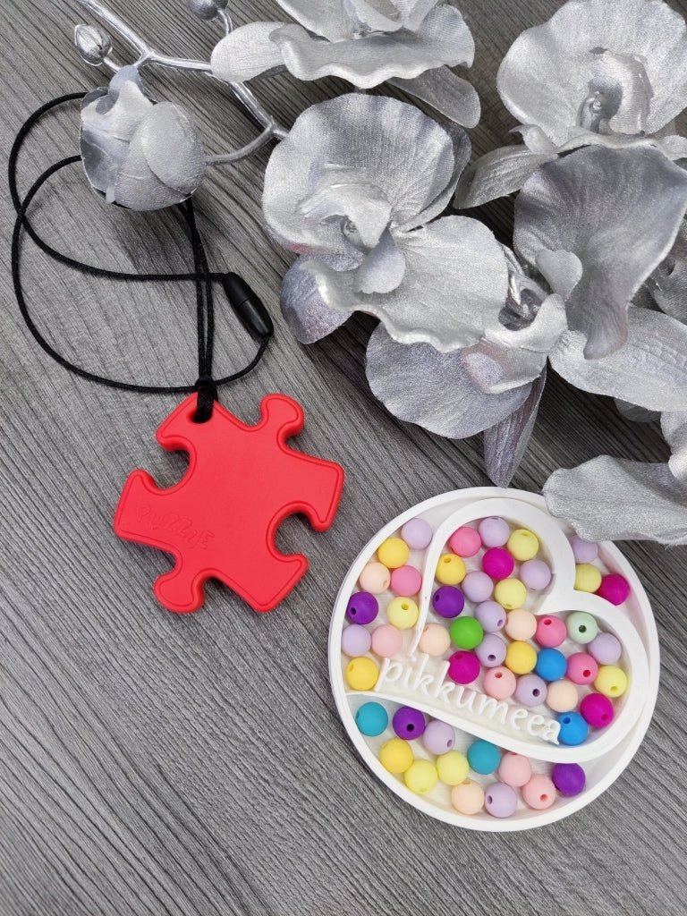 Aistikoru palapeli (eri värejä) - pikkumeea