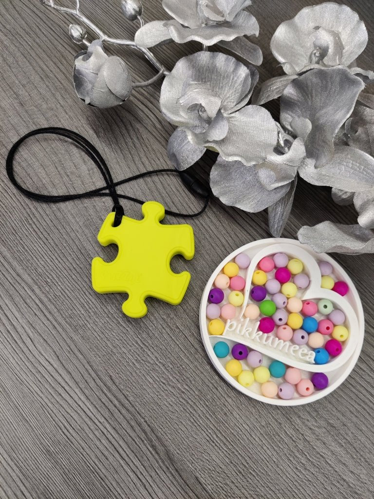 Aistikoru palapeli (eri värejä) - pikkumeea