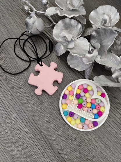 Aistikoru palapeli (eri värejä) - pikkumeea