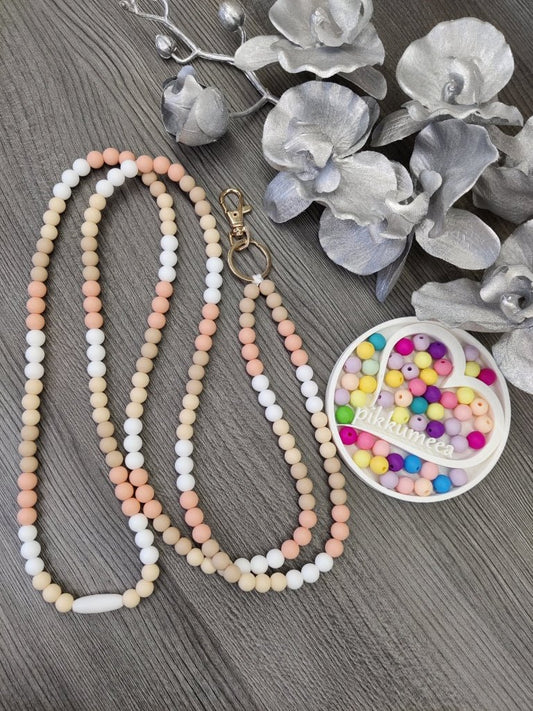 Avainnauha olan yli (valkoinen / beige / persikka / vaalea beige) - pikkumeea