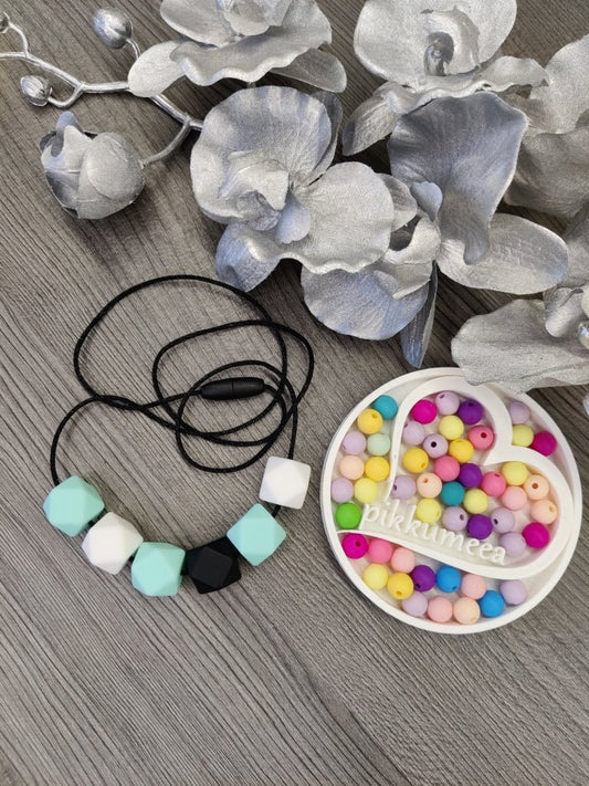 Imetys - /kantokoru (eri värejä) - pikkumeea