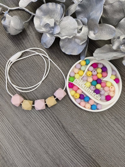 Imetys - /kantokoru (vaaleanpunainen / puu) - pikkumeea