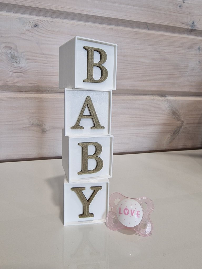Kirjainkuutiot "BABY" - pikkumeea