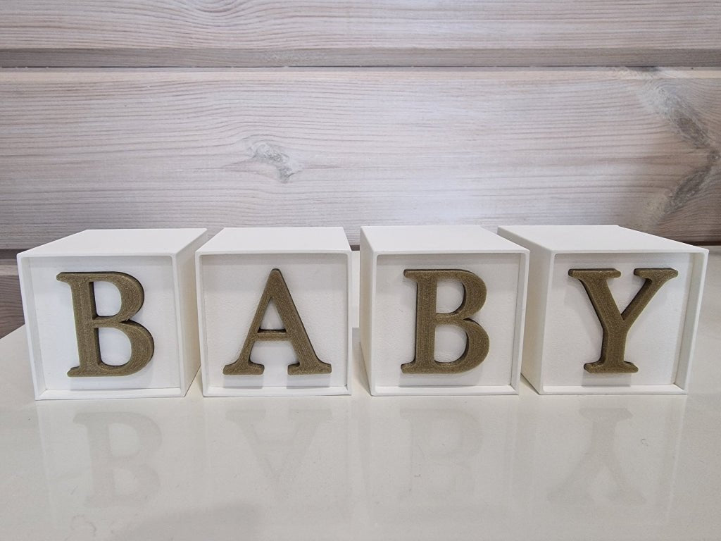 Kirjainkuutiot "BABY" - pikkumeea